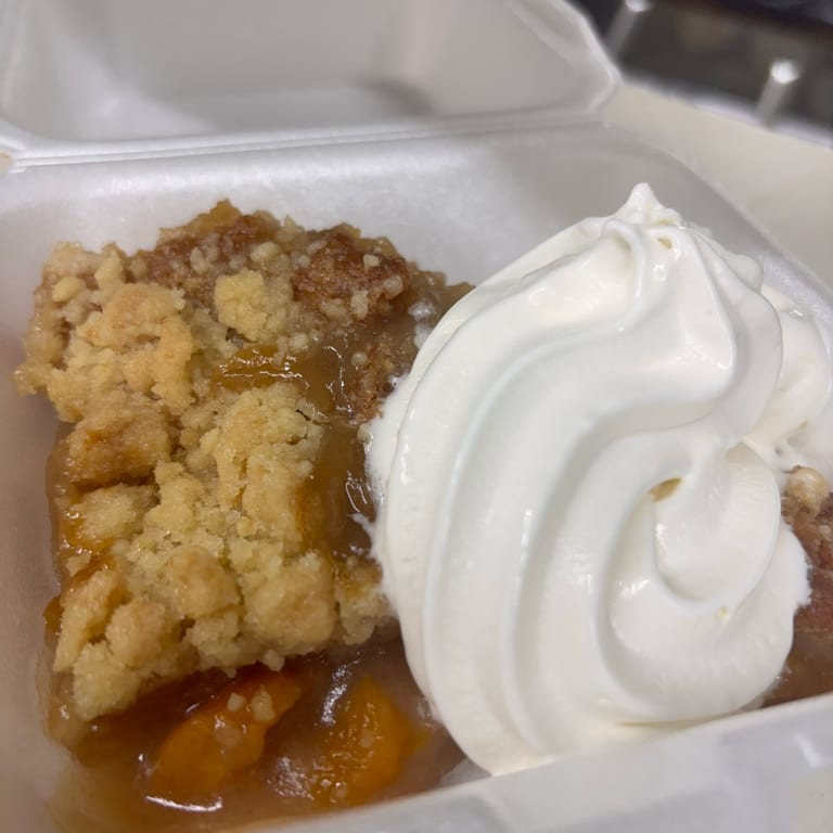 Indulge in our peach cobbler